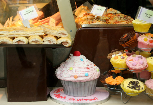 The Victoria Street Shop window showing a selection of cakes and savouries
